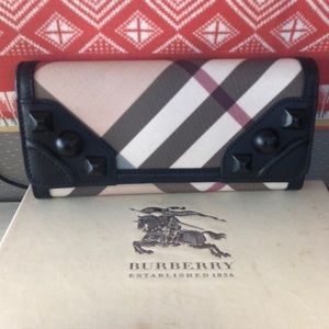 Authentic Burberry Wallet with 12 card holders.